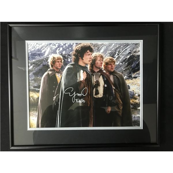 ELIJAH WOOD SIGNED AND CUSTOM FRAMED LOTR 8 X 10 (WWOC COA)