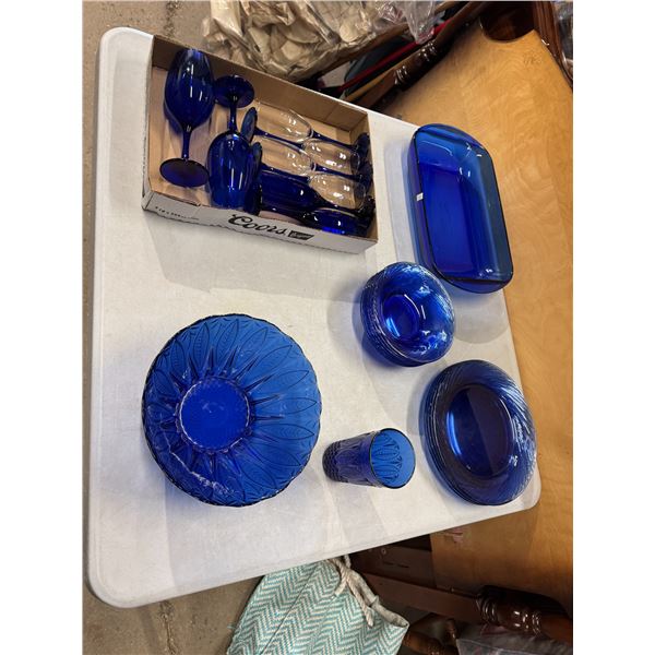 Blue dishes, baking dish, and glasses