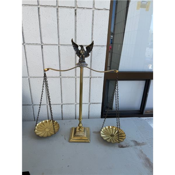 Scale with eagle motive