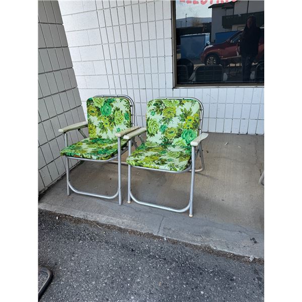2 vintage folding chairs with metal strapping