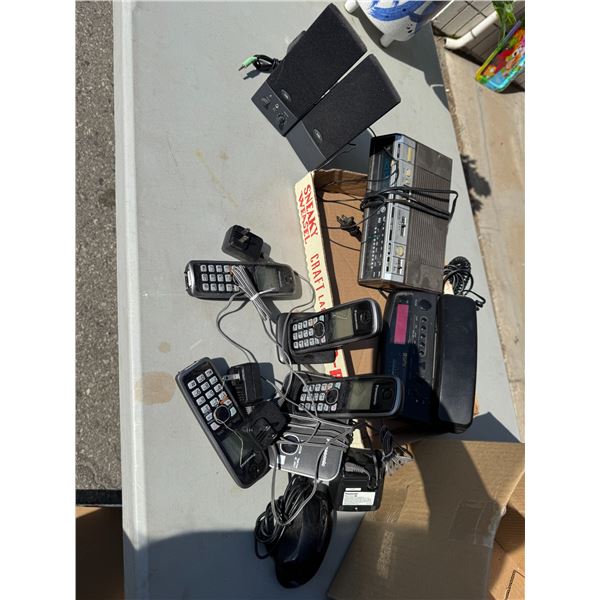 Phones clock radio speakers