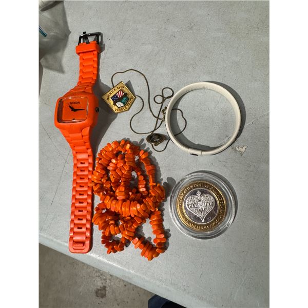 Nixon watch and other items