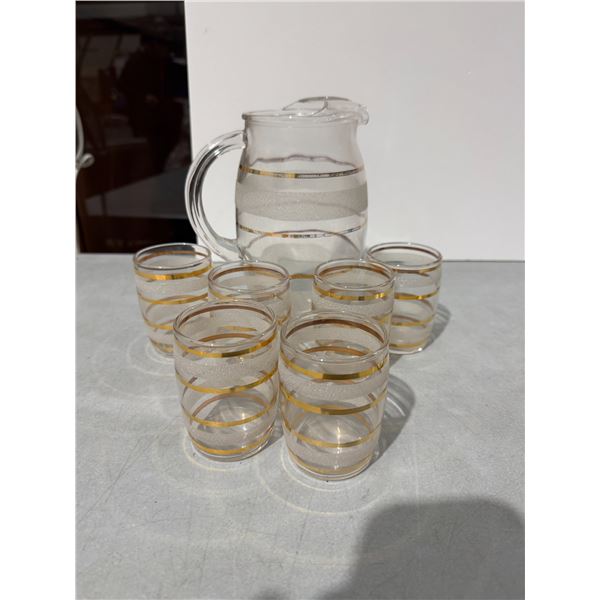 Glass pitcher and juice glasses