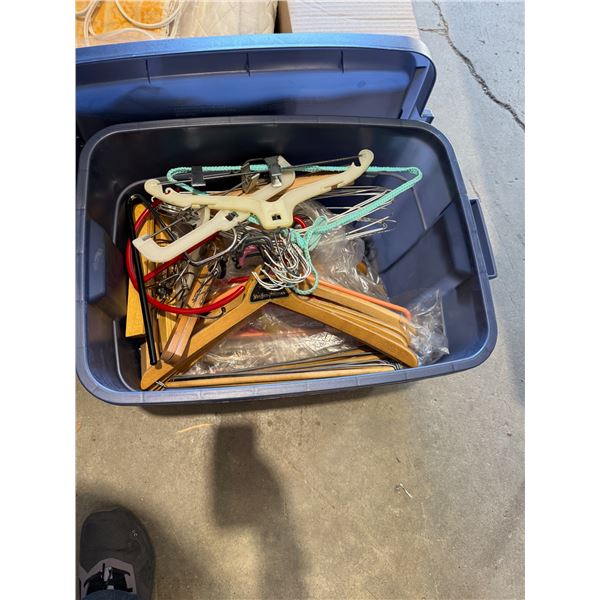 Hangers in bin with lid