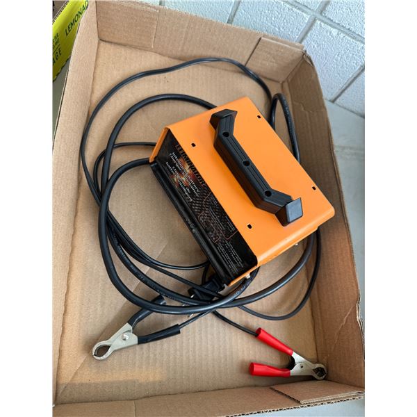 Illuminator battery charger