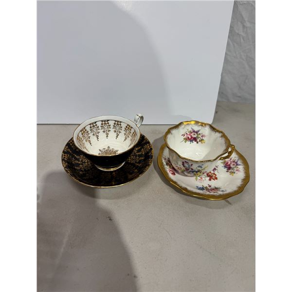 2 tea cups and saucers