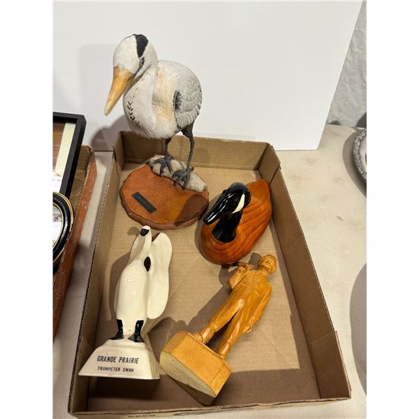 Carved birds and other items