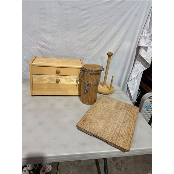Bread, box, paper towel, holder, canisters, and cutting board