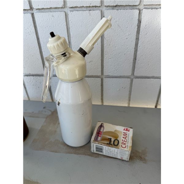 Whipped cream dispenser