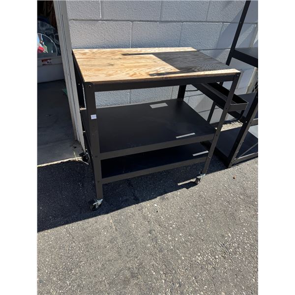 Rolling cart with locking wheels