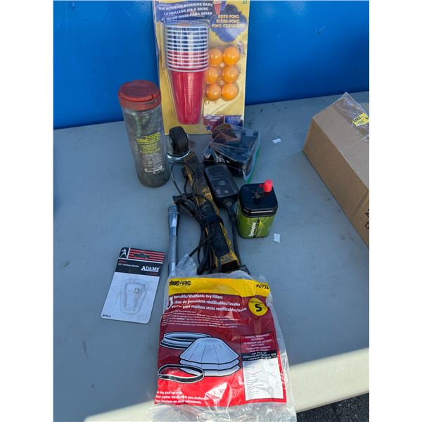 Garage items, bungee cords, beer, pong, light, etc.