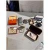 Image 1 : Electric shaver, tuneup kit, travel cases, razor blades, and magnifier