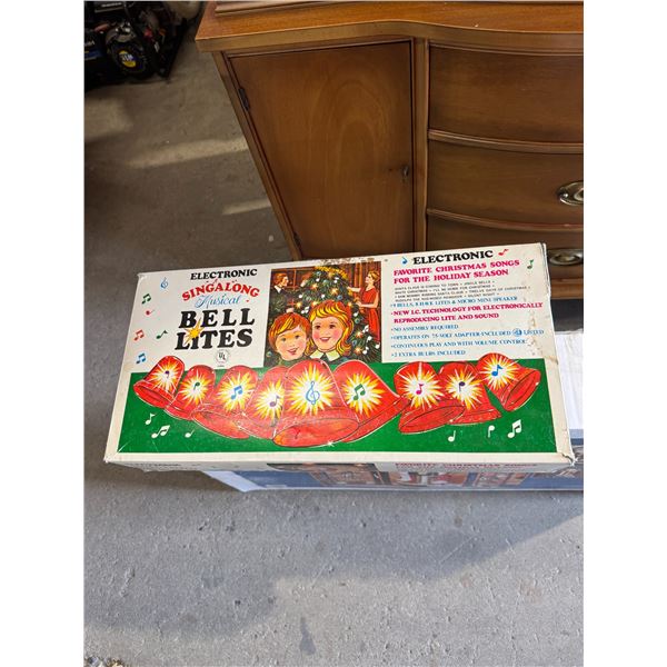 Electronic sing-along musical bell lites