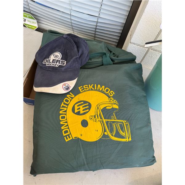 Edmonton Eskimos seat, cushion, and Edmonton Oilers hockey cap