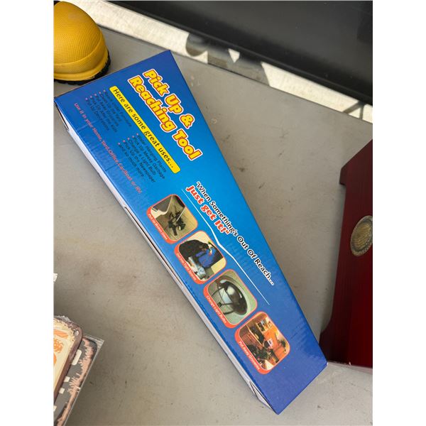 Pick up and reaching tool