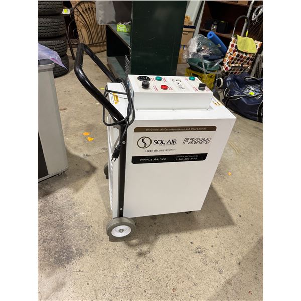 Sol-Air F2000 ultraviolet air and odor control. Runs