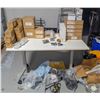 Image 1 : CONTENTS ON AND UNDER TABLE OF PLUMBING SUPPLIES