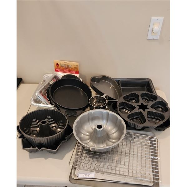 Large Lot of Vintage Bakers Cake Pans...