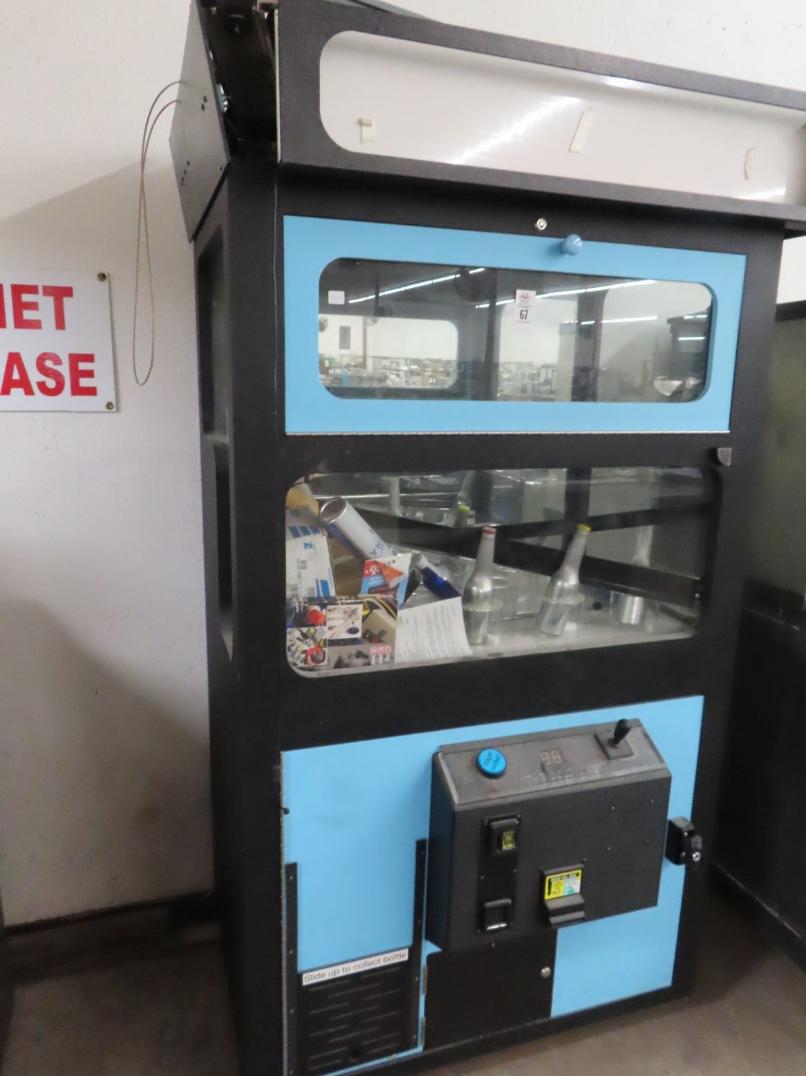 The Cold One Coin Op Beer Claw Grab Machine