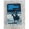 Image 1 : These Thousand Hills Author Signed
