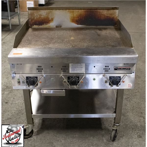 BAILIFF SEIZURE: GARLAND 36" 3 BURNER GRIDDLE ON