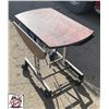 Image 2 : OVAL FOLDING DINING TABLE ON CASTORS