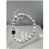 Image 1 : BRAND NEW 8 MM HOWLITE BRACELET ELASTIC