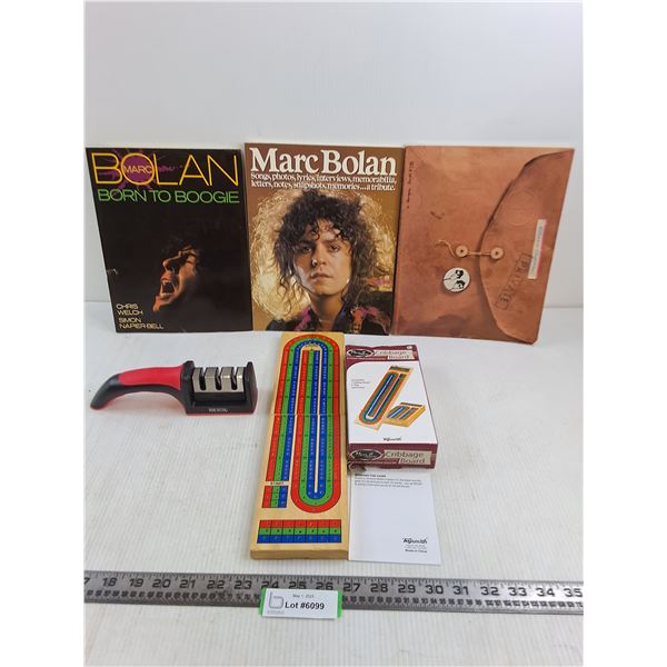 (3) Vintage Soft Cover Books (Bolan, Blues Brothers), Knife Sharpener, Travel Crib Board