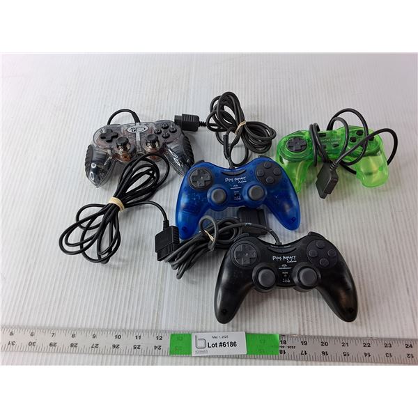 (4) Game Controllers- Dual Impact, Mad Catz, Other. Untested