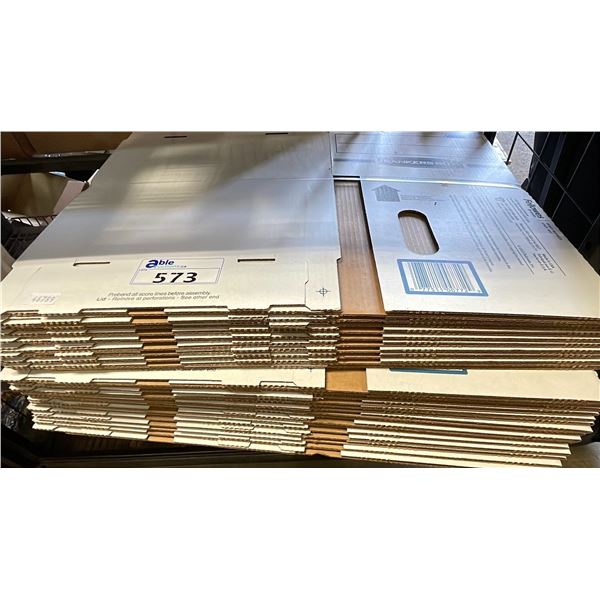 STACK OF FLATTENED BANKERS BOXES