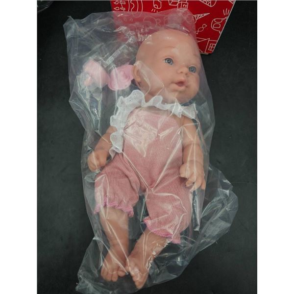 Pure Baby Doll With Pink Romper and Accessory