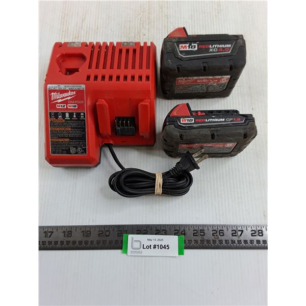 Milwaukee Battery Charger - Powers On, and 2 Rechargeable Batteries