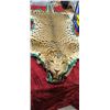 Image 1 : MOUNTED 9 FT LEOPARD RUG  MOSTLY IN GOOD SHAPE BUT EARS AND MINOR HEAD REPAIRS NEEDED