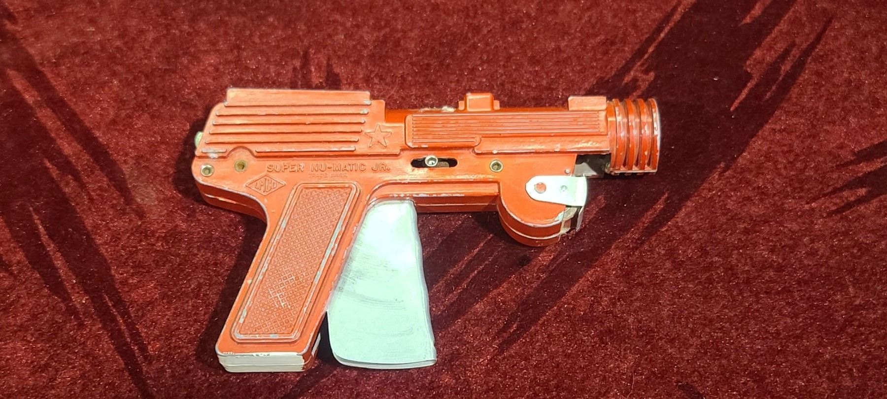 SUPER NU-MATIC JR. PAPER CAP GUN BY LMCO
