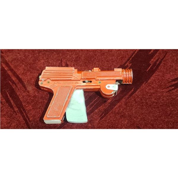 SUPER NU-MATIC JR. PAPER CAP GUN BY LMCO