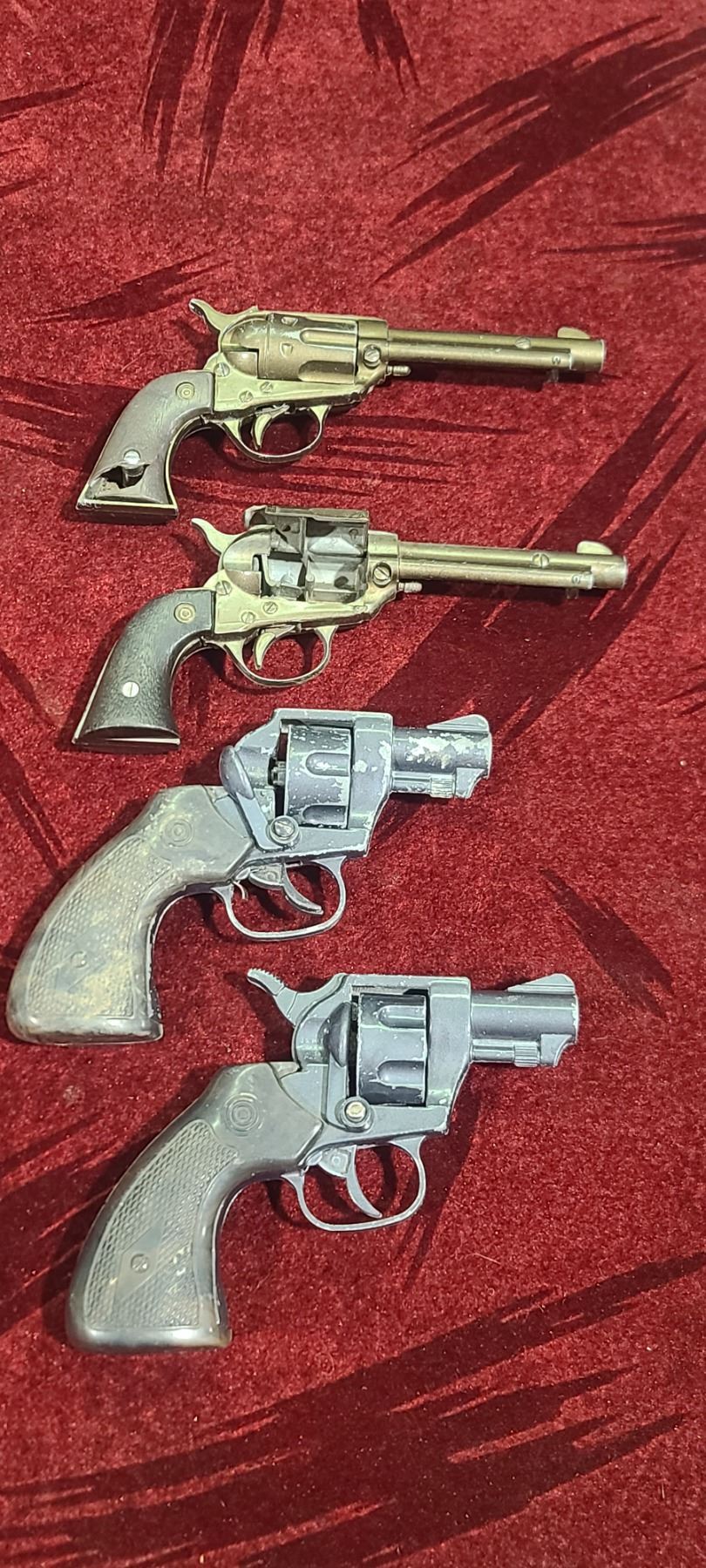 TWO BULLSEYE 50 SHOT PAPER CAP GUNS BY DAISY
