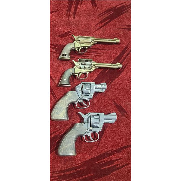 TWO BULLSEYE 50 SHOT PAPER CAP GUNS BY DAISY