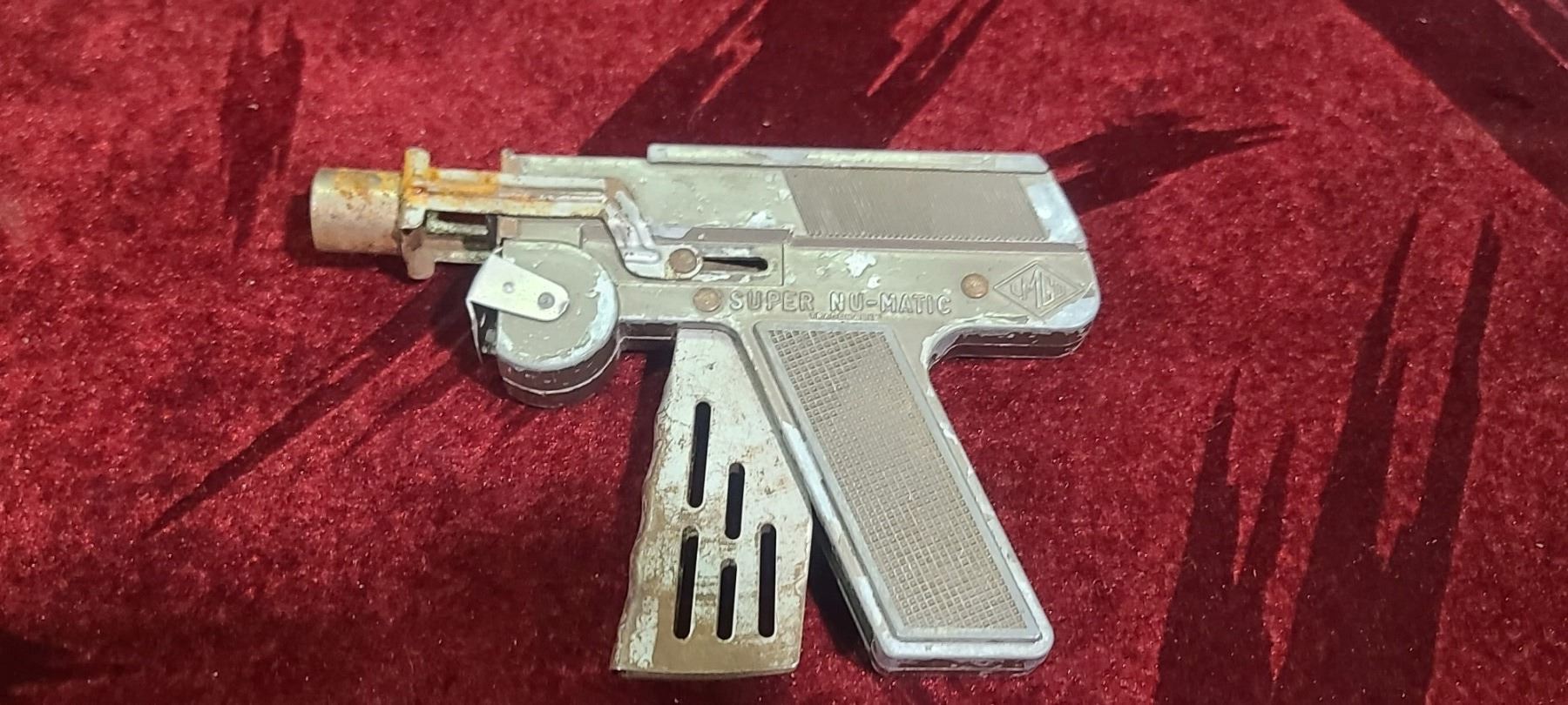 SUPER NU-MATIC JR. PAPER CAP GUN BY LMCO