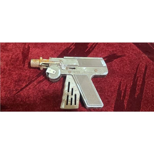 SUPER NU-MATIC JR. PAPER CAP GUN BY LMCO