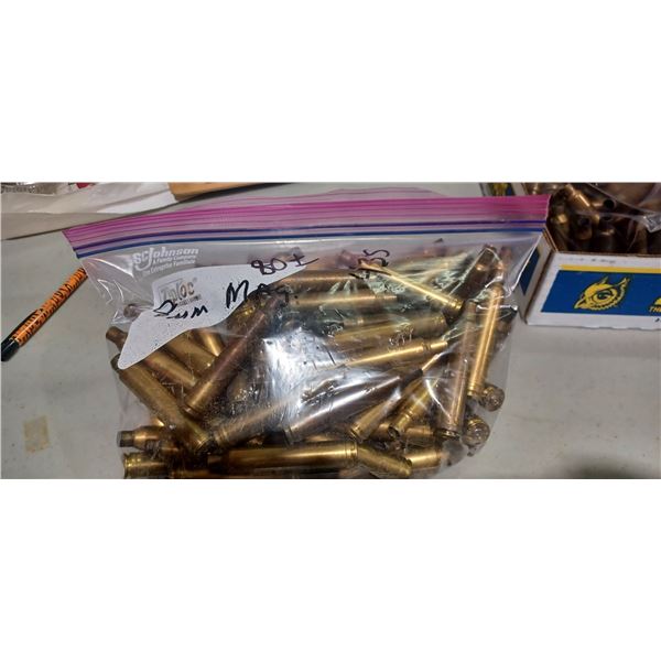 APPROX 80 ROUNDS OF 8MM   BRASS