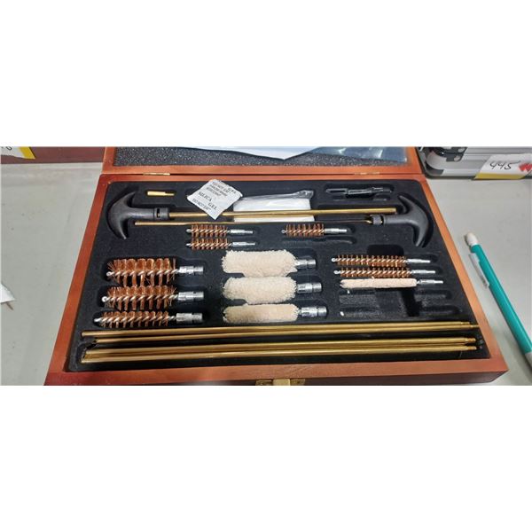 NEW CLEANING KIT 22. CAL TO 12GA C/W WOOD BOX