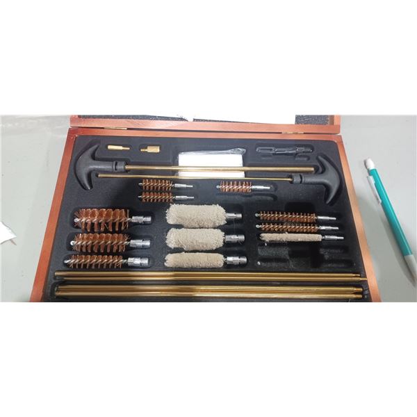 NEW CLEANING KIT 22. CAL TO 12GA C/W WOOD BOX