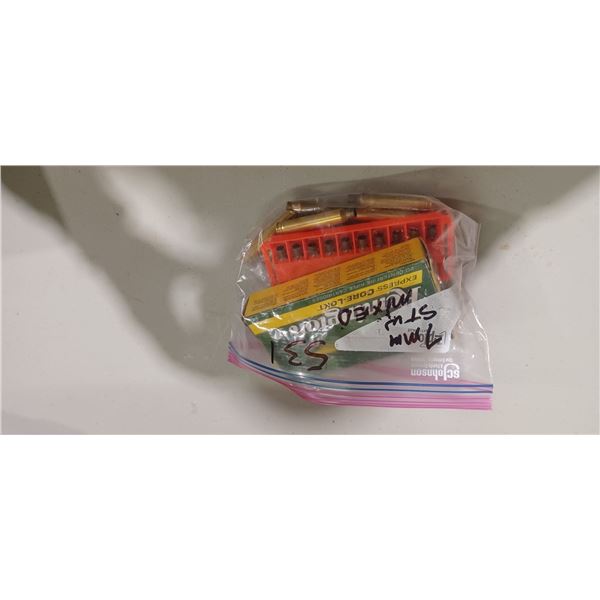 7 - REMINGTON 7MMSTW 140 GRAIN AMMO AND 26 EMPTY CASE