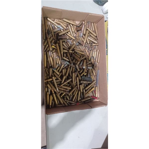 FLAT OF ASSORTED AMMO AND BRASS