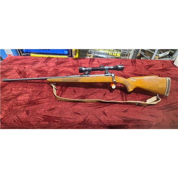 LEFT HANDED SAVAGE MODEL 1100L SERIES J - COMES WITH 4X REDFIELD SCOPE - 24" BARREL - MISSING BEAD O