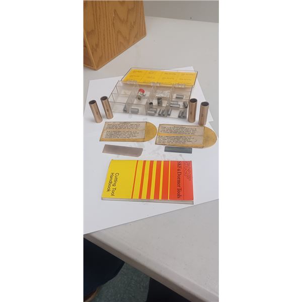 ASSORTMENT OF REAMER BUSHING, STONES, GUIDES, SNAP RING, AND CUTTING HANDBOOK