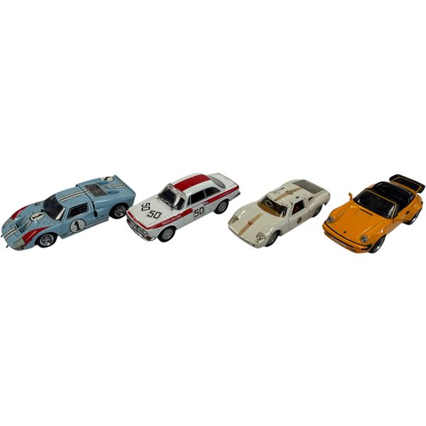 4 Die Cast 1/43 Scale Cars: Ford MK II 7080, Alfa Romeo 2000 GTV Brandos, Ford Lola GT, & Porsche 91