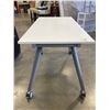 Image 2 : WHITE ROLLING TABLE