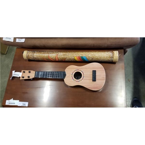 CARVED AND HAND PAINTED RAINSTICK AND UKULELE