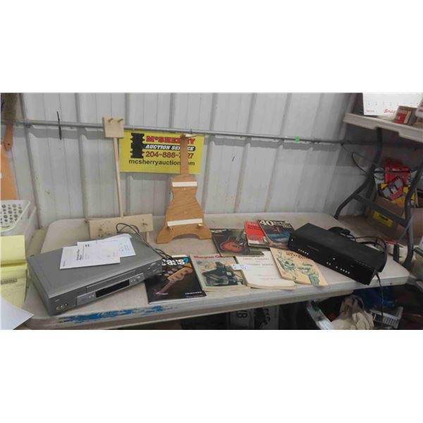 2 VHS Players, Sheet Music, 2 Folky Guitar Stands 